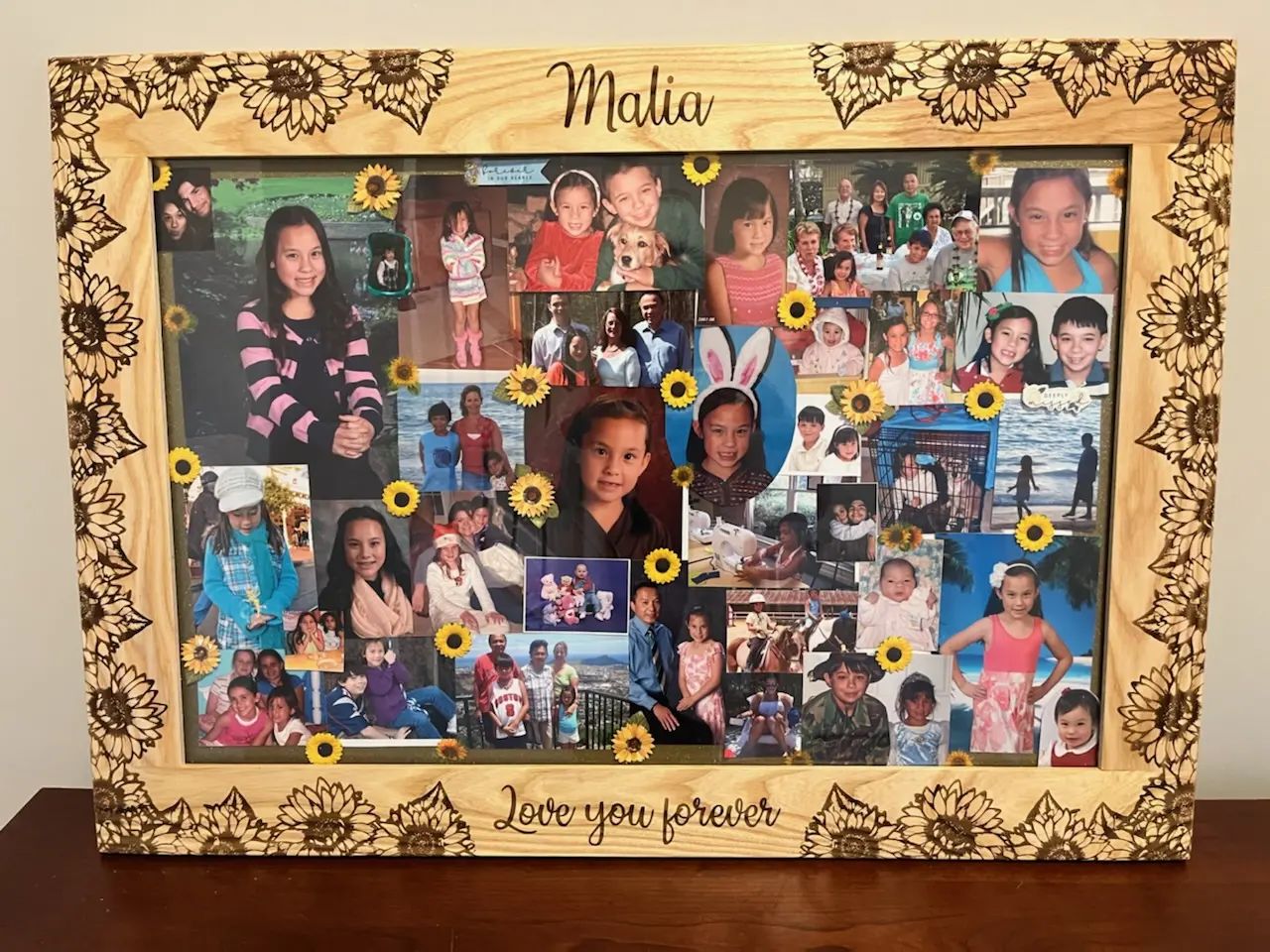 A little over a year ago, my cousin Malia unexpectedly passed away. This photo collage was at her service and my Aunt asked if I could make a frame for it.

I had to make sure it was special, detailed, and one of a kind, just like Malia was. 

I used some ash, some creative design work and the laser to engrave the entire frame with sunflowers. You can't tell from the picture, but there is quite a bit of depth to each flower and the text so you can feel them when you run your hand over them. 

I gave the frame to my Aunt on Easter Sunday and we were able to share a very special moment. 

I hope you like it Malia, we miss you  very much!